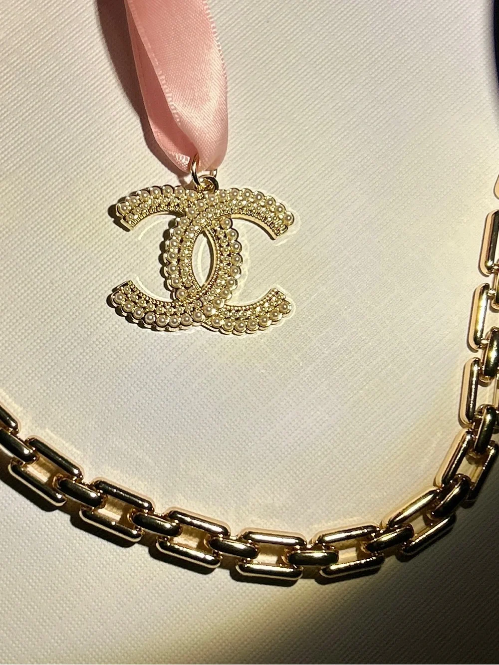 CHANEL Gold CC Pendant with Pink Ribbon New Elegant Chain